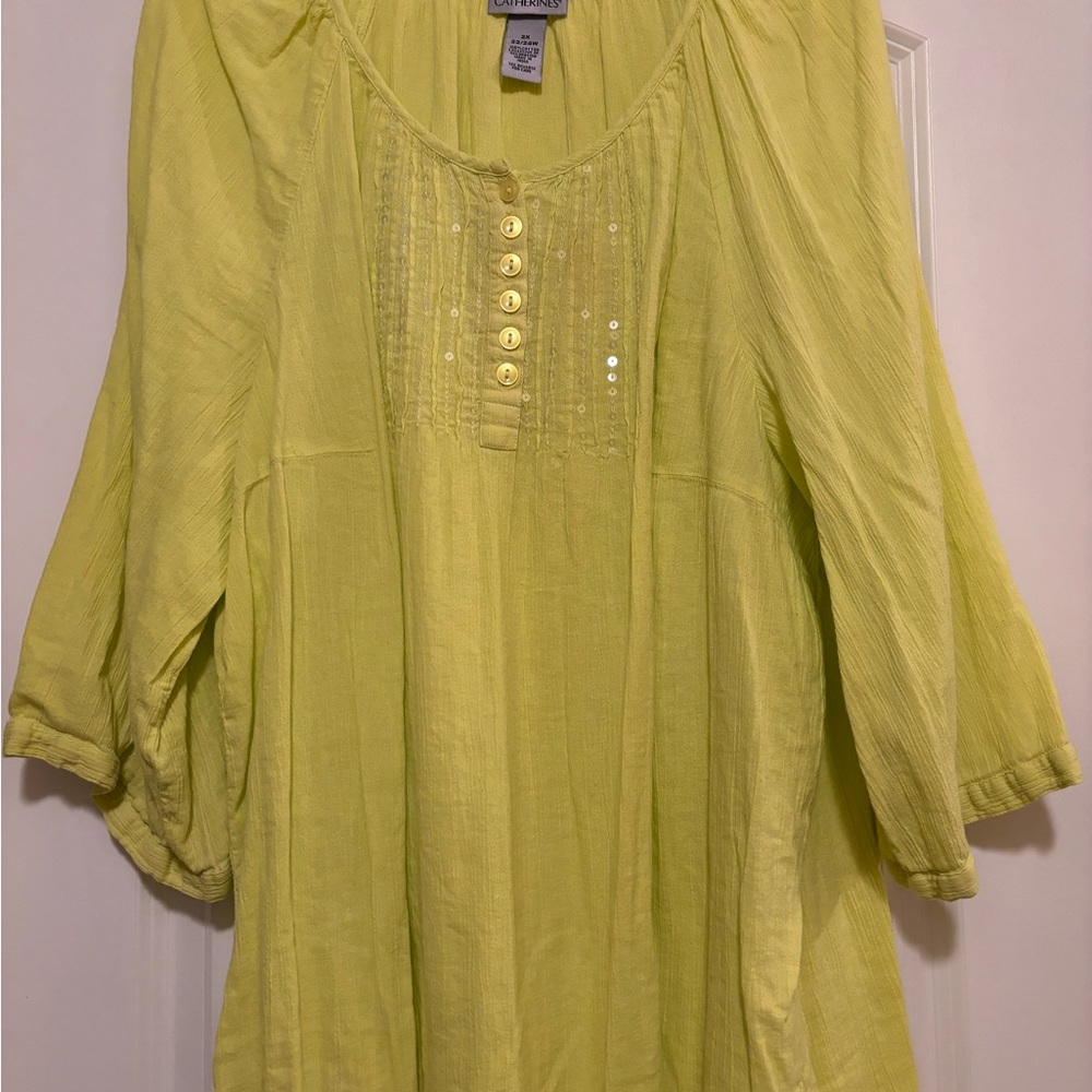 Beautiful shirt with sparkly sequined details.